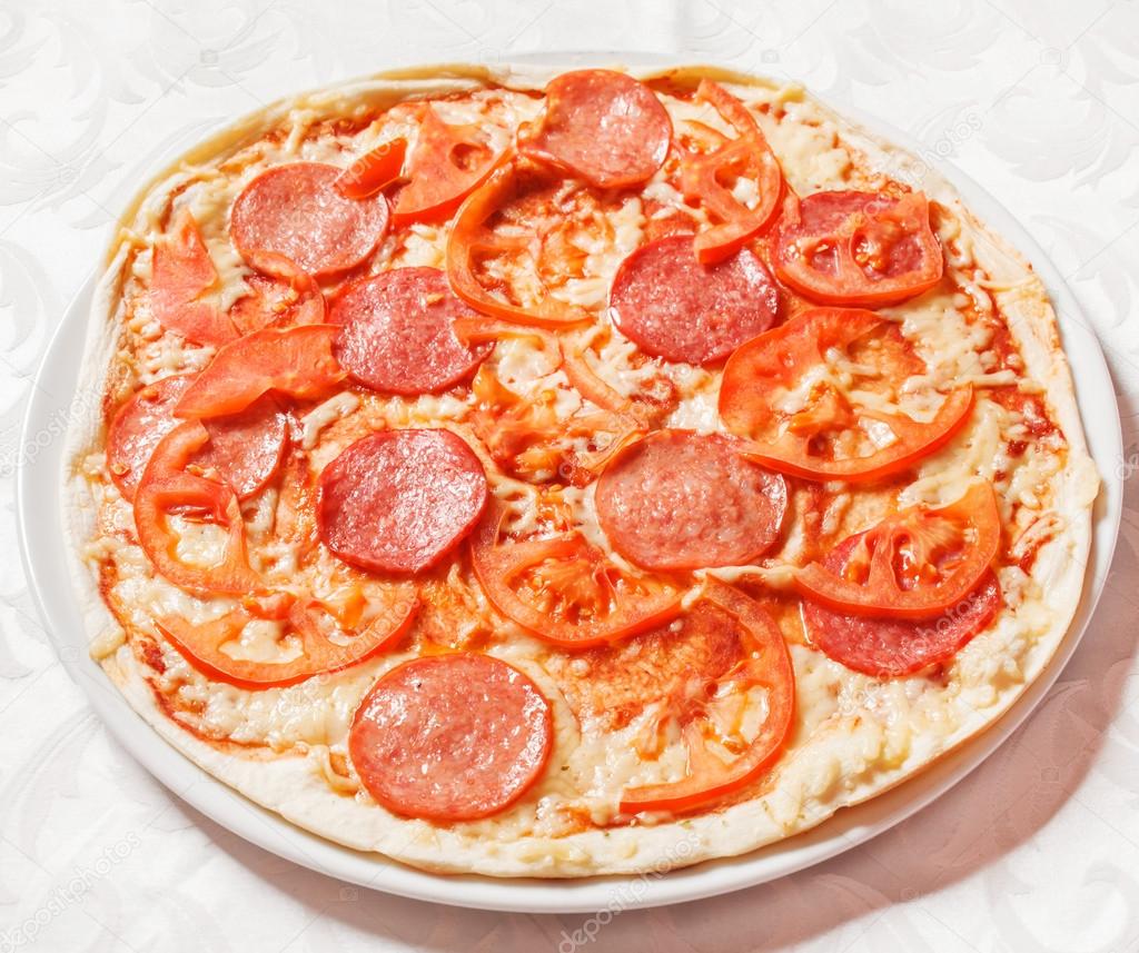 Tasty pizza with tomatoes