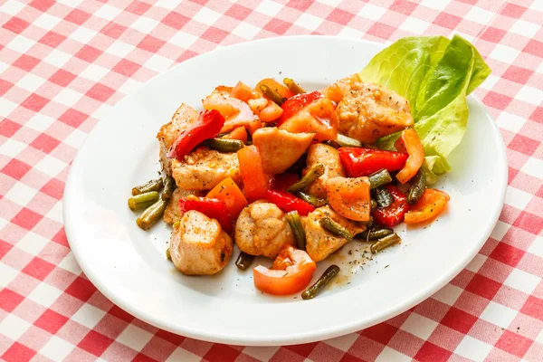 Meat with vegetables on plate — Stock Photo, Image