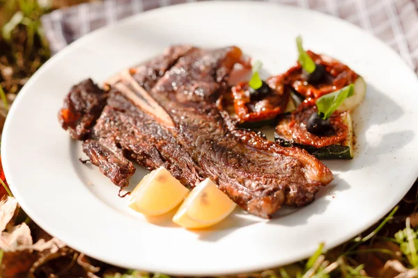 Grilled steak on plate — Stock Photo, Image