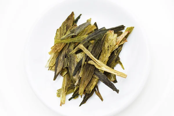 Hojas de té verde seco —  Fotos de Stock
