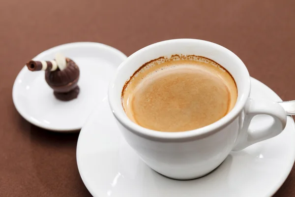 Cup of cappuccino on saucer — Stock Photo, Image