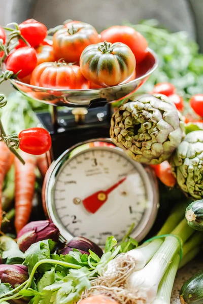 Fresh vegetables on scales — Stock Photo, Image