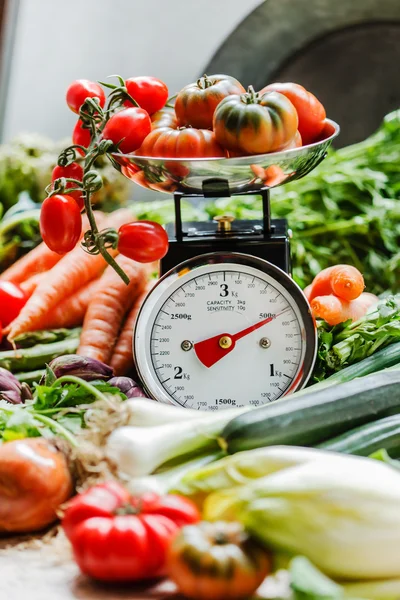 Fresh vegetables on scales — Stock Photo, Image