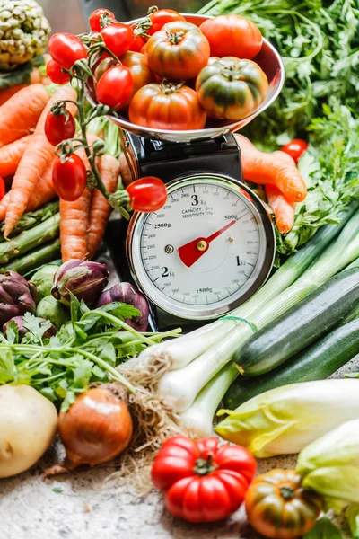 Fresh vegetables on scales — Stock Photo, Image