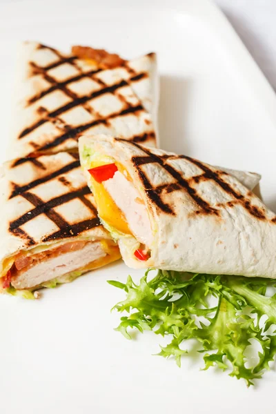 Tasty wrapped tortilla — Stock Photo, Image