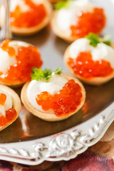 Canape with caviar on plate — Stock Photo, Image