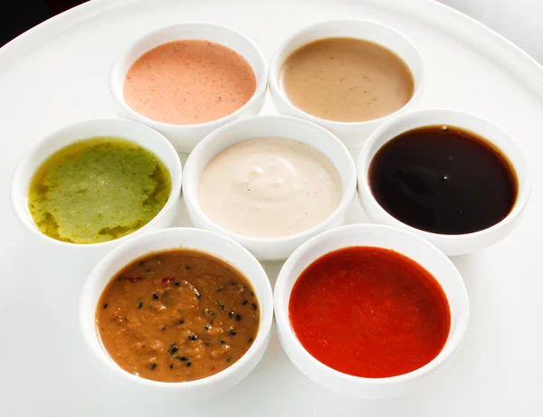 Verschillende kleurrijke sauzen — Stockfoto