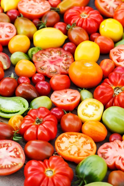 Färgglada tomater bakgrund — Stockfoto