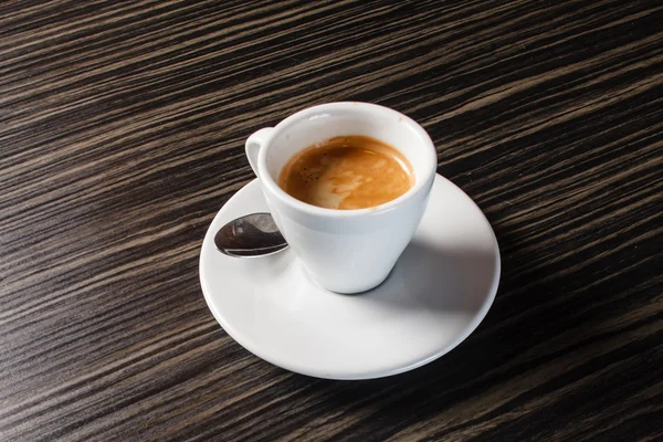 Cup of cappuccino on saucer — Stock Photo, Image