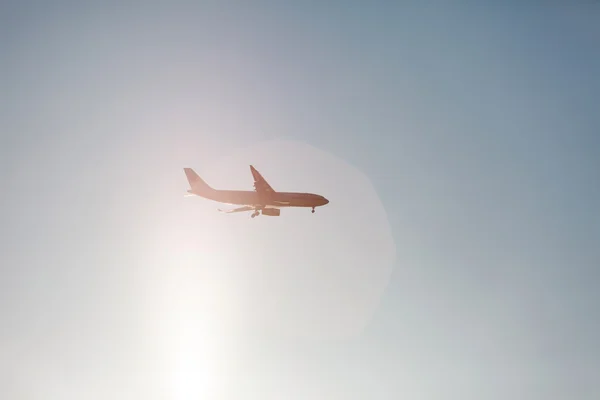 Passenger plane in sky — Stock Photo, Image