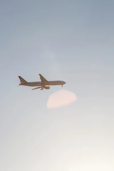 Passenger plane in sky — Stock Photo, Image
