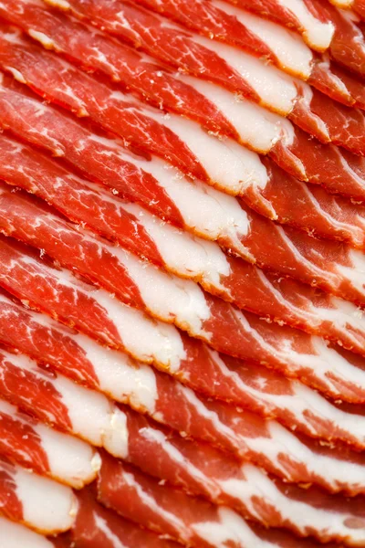 Fette di prosciutto primo piano — Foto Stock