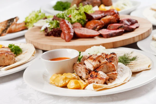 Meat with vegetables dishes — Stock Photo, Image