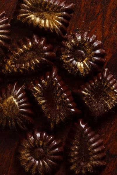 Doces com pó dourado — Fotografia de Stock