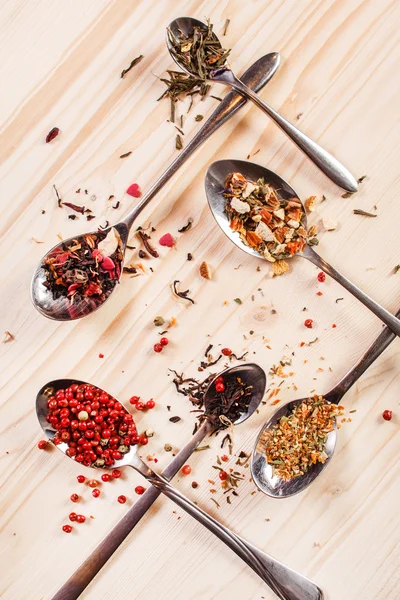 Spices on spoons on table — Stock Photo, Image