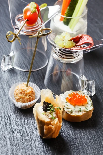 Tasty canapes with fish — Stock Photo, Image