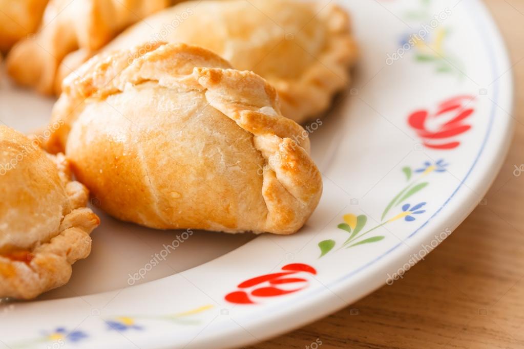 Stuffed pies on plate