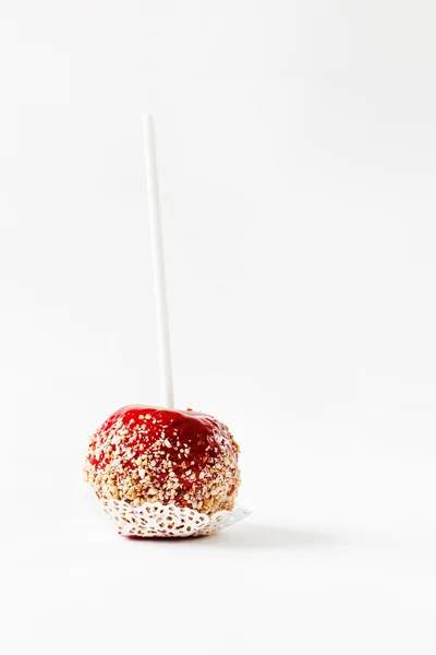 Caramel apple on stick — Stock Photo, Image