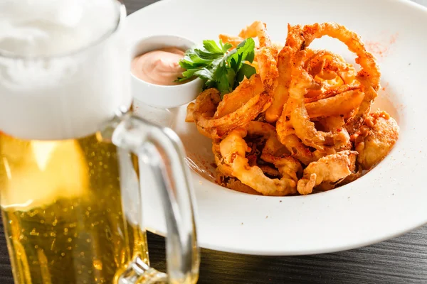 Onion rings on plate — Stock Photo, Image