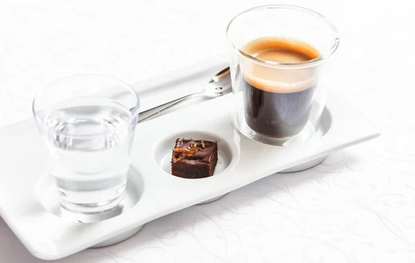 Cup of Espresso with candy — Stock Photo, Image