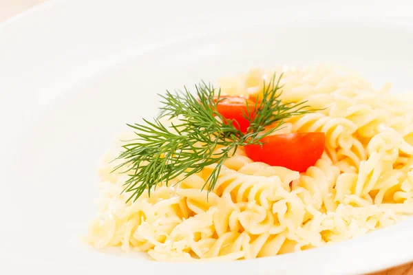Tasty pasta with cheese and tomato — Stock Photo, Image