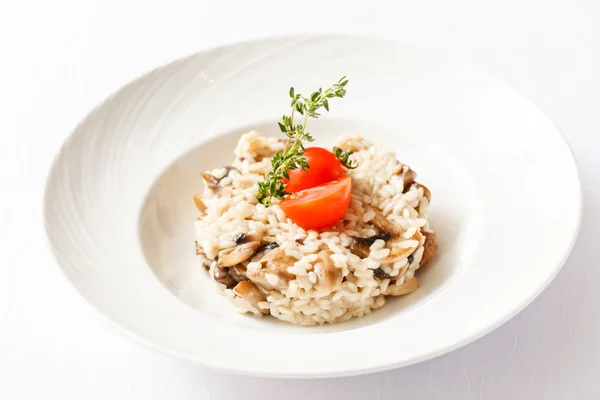 Risotto with mushrooms and tomato — Stock Photo, Image