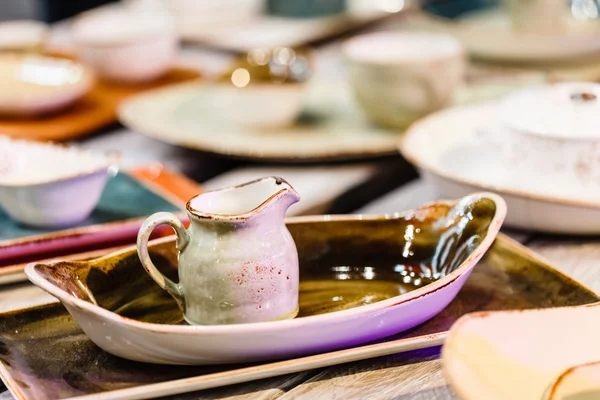 Ceramic tableware on table — Stock Photo, Image
