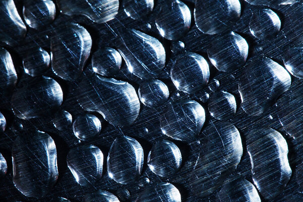 water drops on steel background