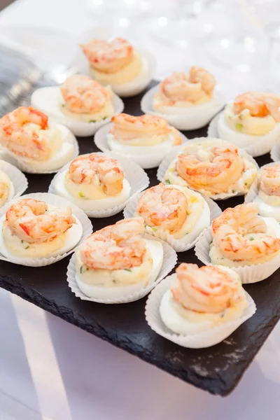 Seafood canapes with shrimps Stock Image