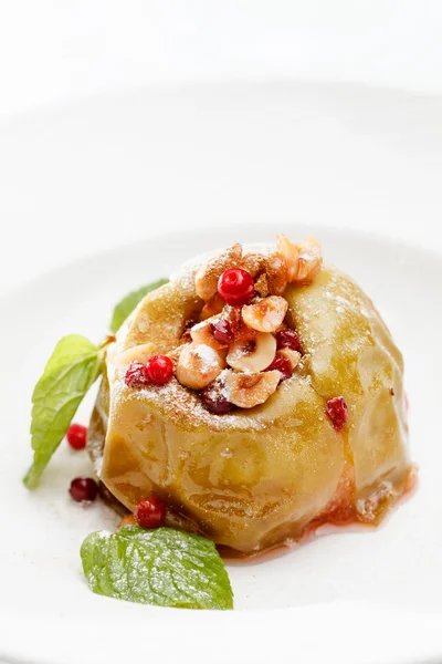 Baked apple with mint leaves — Stock Photo, Image