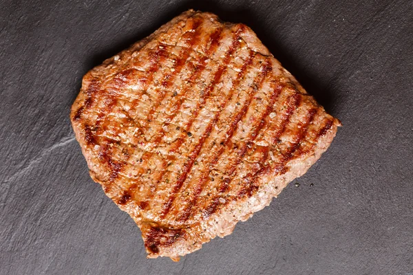 Tasty rib-eye steak — Stock Photo, Image