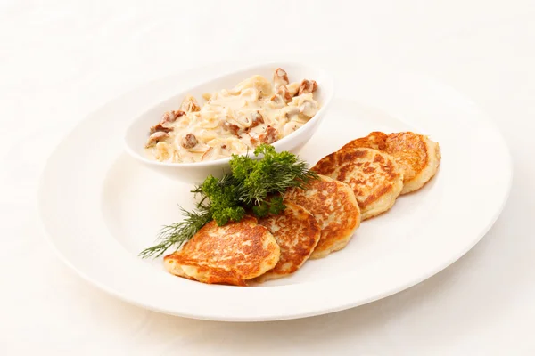 Potato pancakes with mushrooms — Stock Photo, Image