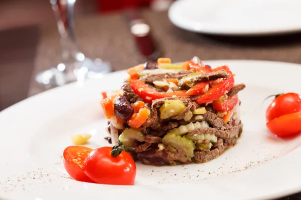 Meat salad on plate — Stock Photo, Image