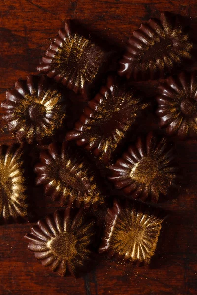 Chocolate sweets with powder — Stock Photo, Image