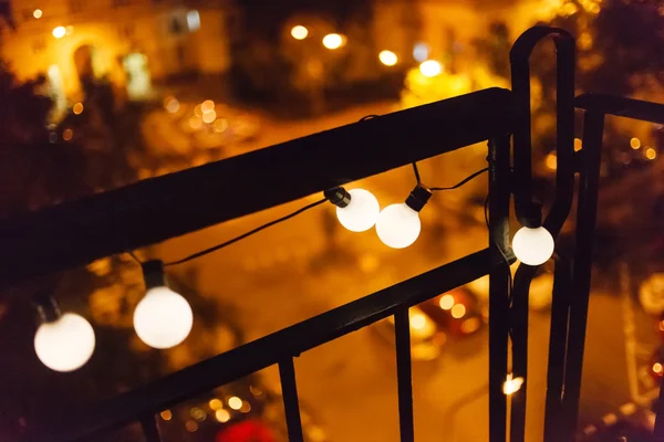 Night garland lights on balcony — Stock Photo, Image