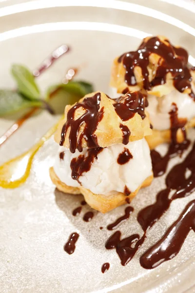 Profiteroles with ice cream — Stock Photo, Image