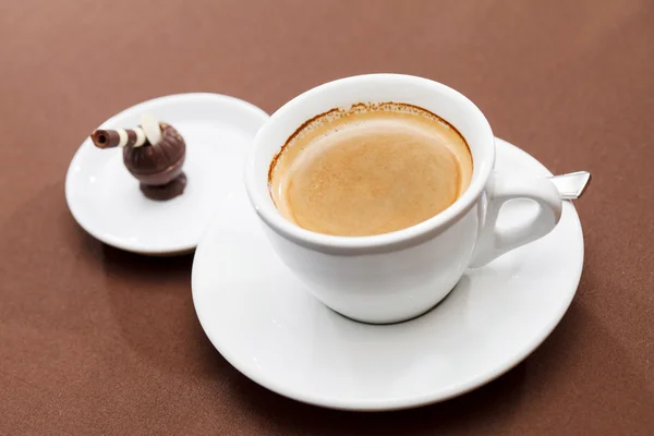 Cup of coffee on plate — Stock Photo, Image