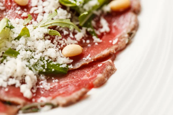 Meat carpaccio appetizer — Stock Photo, Image