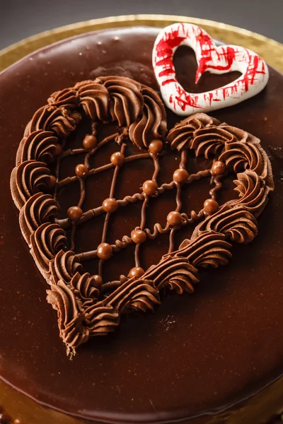Chocolate cake in shape of heart — Stock Photo, Image