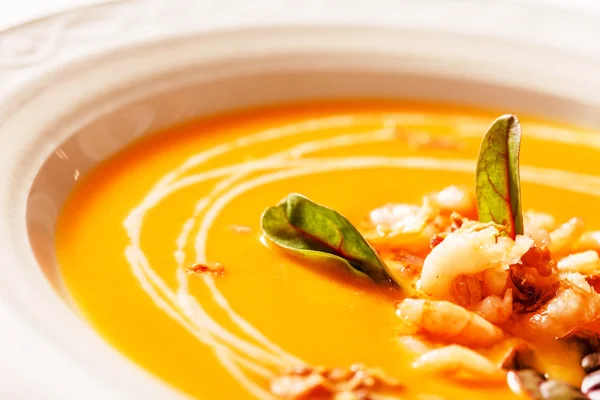 Pumpkin soup with shrimps — Stock Image Pumpkin soup with shrimps Royalty Free Stock Images
