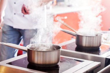 Chef at work on restaurant kitchen
