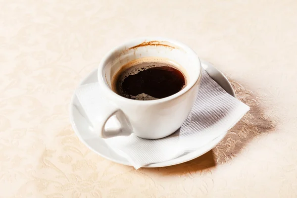 Cup of coffee on light — Stock Photo, Image