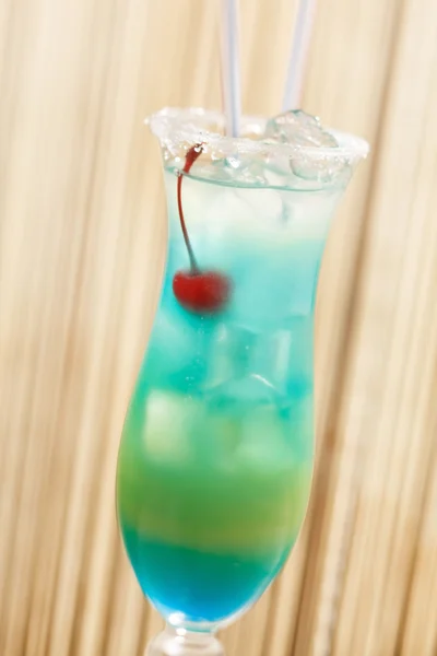 Blue cocktail with cherry — Stock Photo, Image