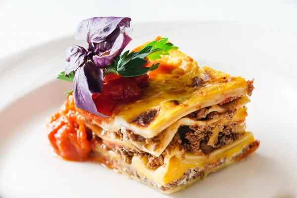 Tasty lasagna on plate — Stock Photo, Image