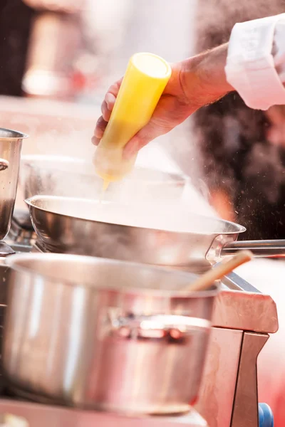 Chef cooking  at work — Stock Photo, Image