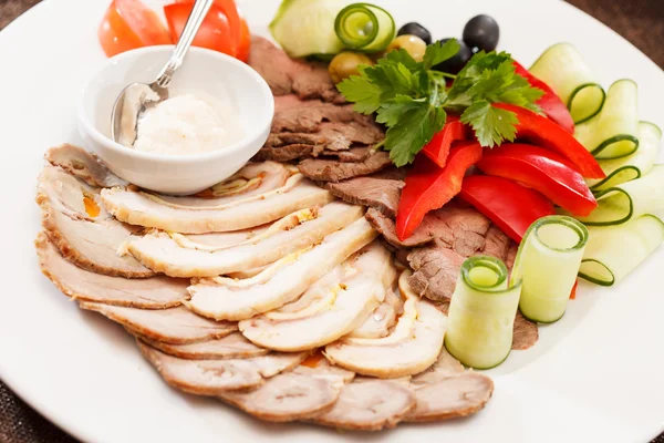 Meat appetizer on plate — Stock Photo, Image