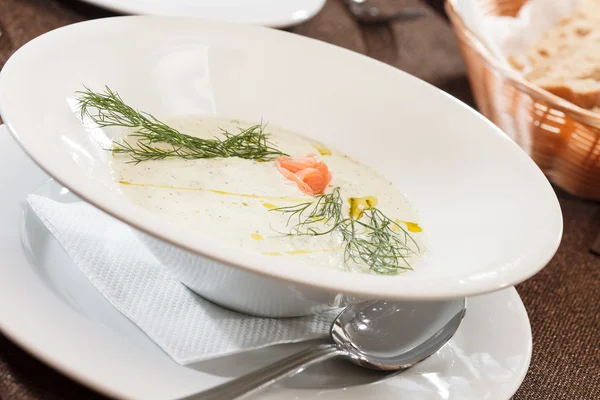 Cream soup with salmon in plate — Stock Image Cream soup with salmon in plate Royalty Free Stock Photos