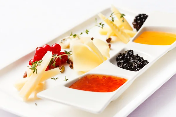 Cheese appetizer on plate — Stock Photo, Image