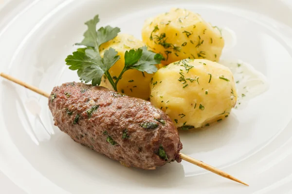 Beef kebab with potatoes — Stock Photo, Image