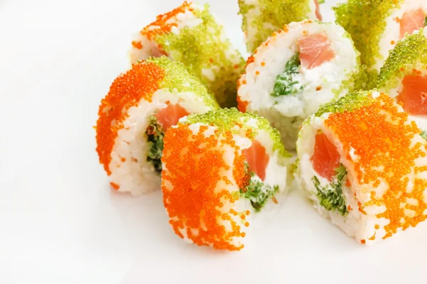 Tasty sushi rolls on white — Stock Photo, Image